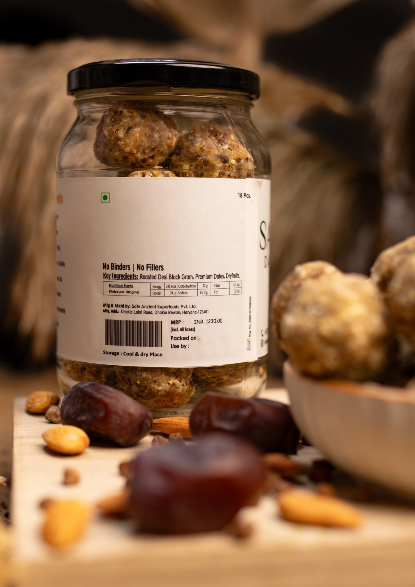 Close-up of gluten-free vegan kala chana laddu with dry fruits
