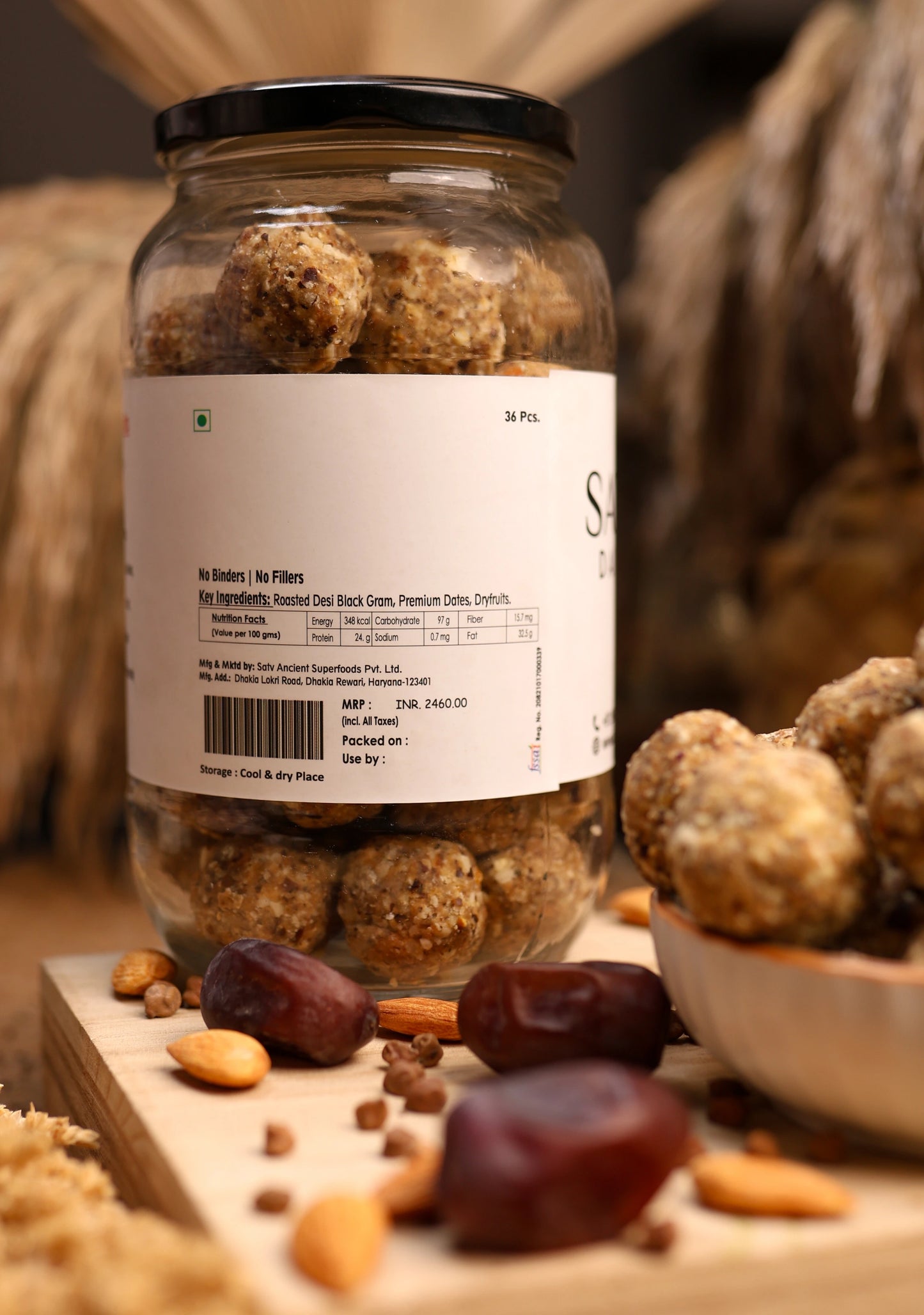 Satv Dairy Chana Laddu placed in a handmade wooden bowl