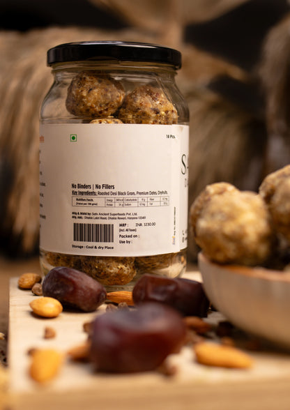 Close-up of gluten-free vegan kala chana laddu with dry fruits