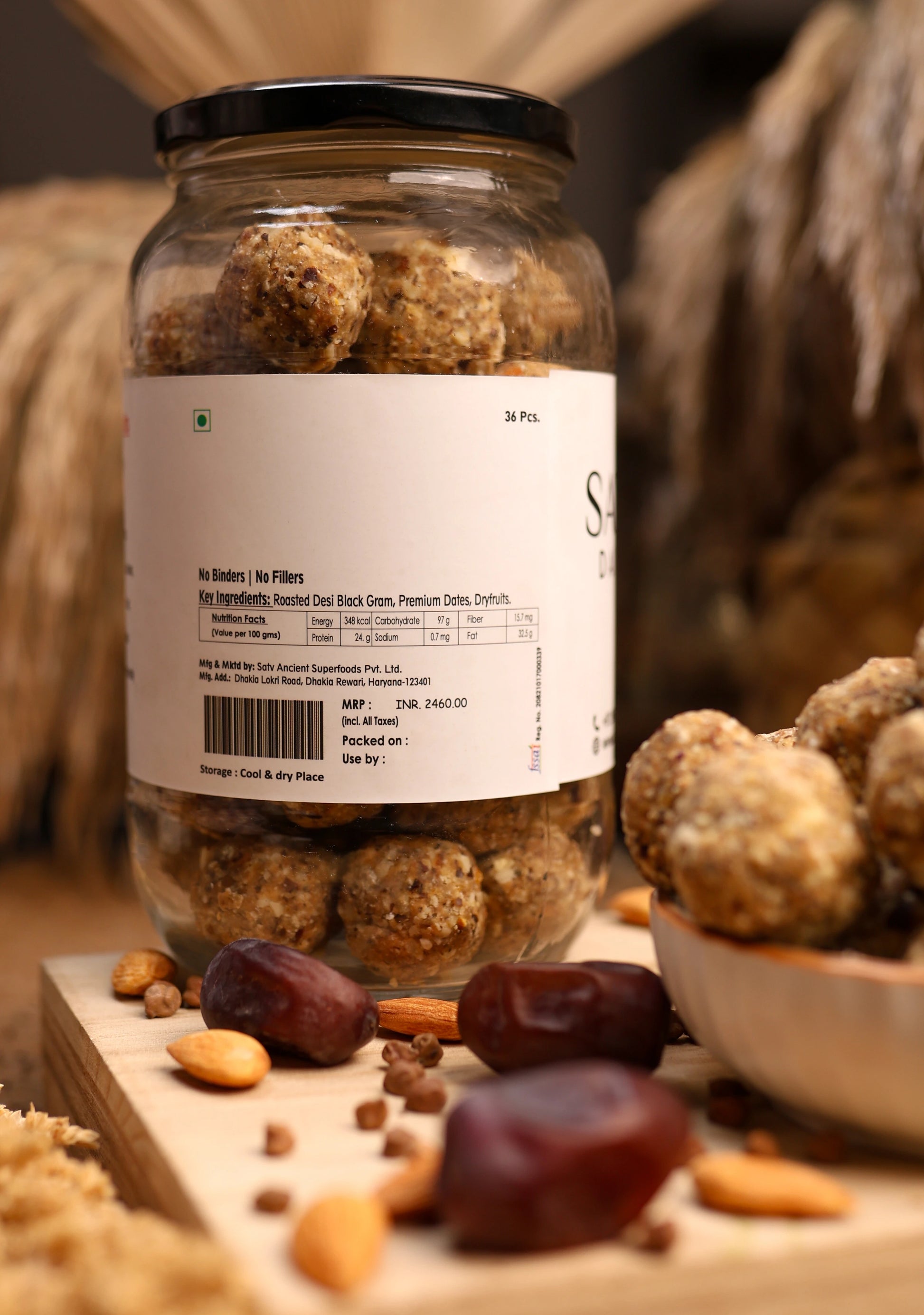 Satv Dairy Chana Laddu placed in a handmade wooden bowl